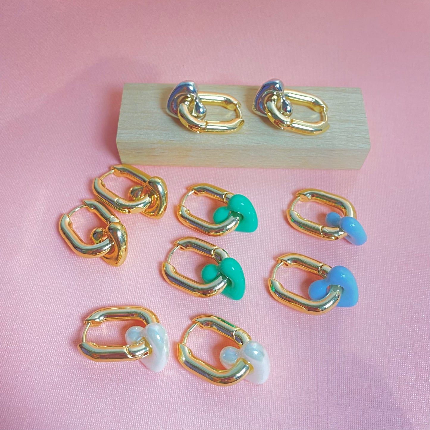 Mixed Feelings Heart Huggie Earrings