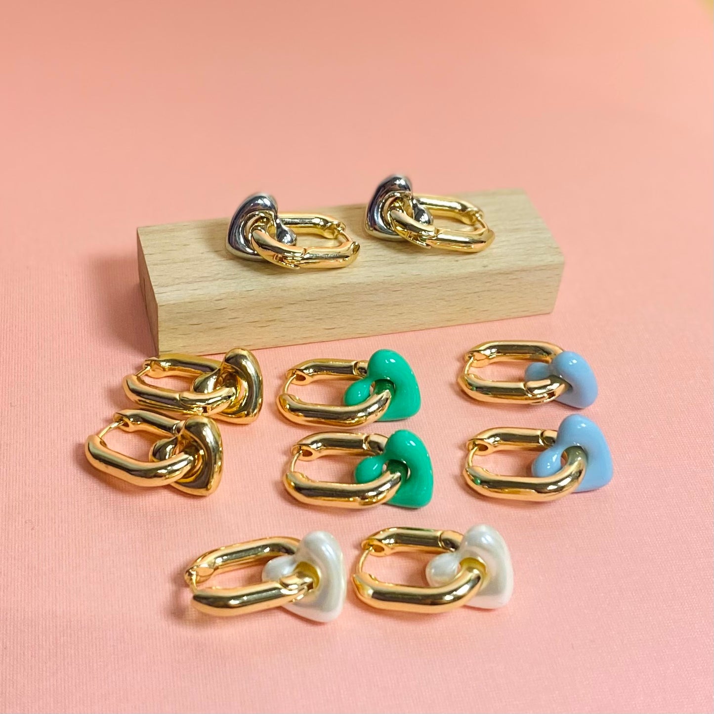 Mixed Feelings Heart Huggie Earrings